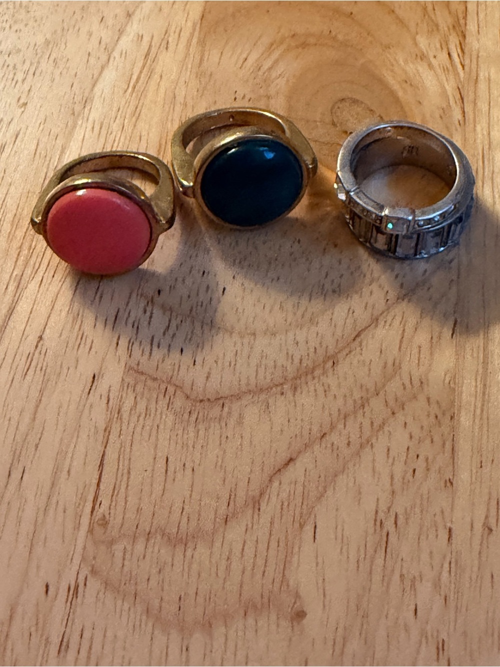 Banana Republic Four fashion rings with clear, green, and coral stones. 90s.